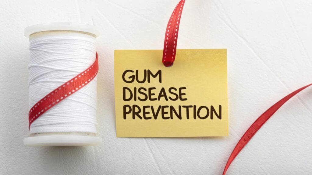 gum disease prevention spool of thread image