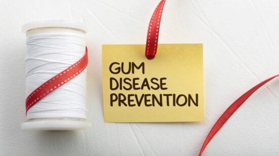 spool of thread representing gum disease prevention