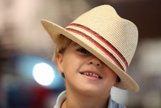 Child wearing a Fedora