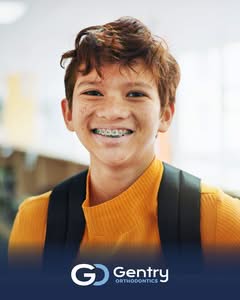 back to school young boy with braces